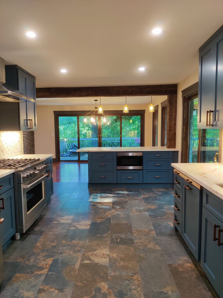 Semi-custom cabinets and Neolithic counters with slate porcelain large format tiles